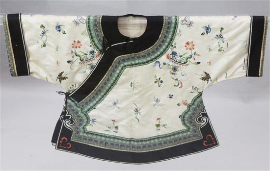 A Chinese oyster satin jacket, c.1880, length 60cm, removable perspex case